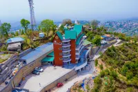Justa Birding Resort & Spa - Best Dhauladhar View Resort Отели рядом с достопримечательностью «Додан човк»