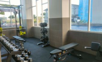New Studio Apartment with Strategic Location at Suncity Residence By Travelio