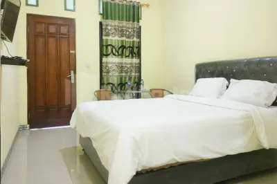 Ambarita Seaview RedPartner Hotel dekat Toko boby agen brilink