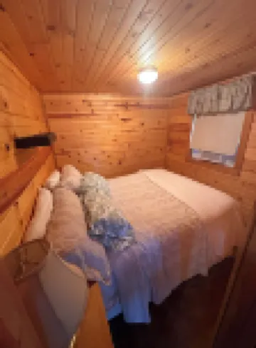 Cute Cabin on Big Pine Lake with a Large Fenced Yard and Lake Access