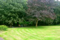 Vacation apartment for 4 people (+ two babies / toddlers) with very large garden Hotels near Muhlenmuseum Pewsum