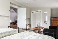 Historic quaint property. Enjoy a day at the beach then a dip in pool and relax.