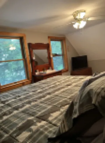 Private Cottage on Manistee Lake with beautiful lake views and sunsets.