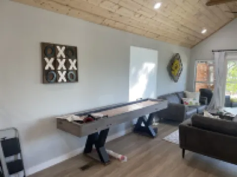 SHORT WALK TO WATER & NESTLED IN THE TREES THIS BEAUTIFUL CABIN HAS LAKE VIEWS