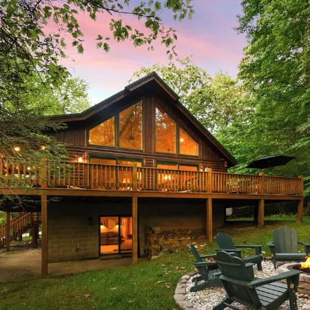 Logged & Loaded Cabin! 9Min to WISP! Hot tub, fire pit! Pets! EV charger!