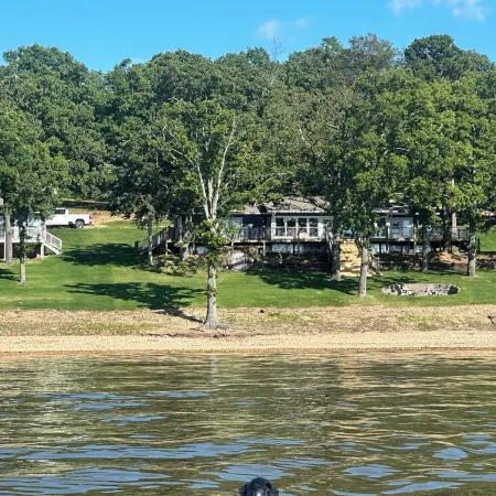 Waterfront with Private dock w/ amazing views, fire pit and pet friendly!