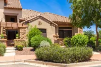 Walk to the Wigwam from this charming single-level condo!