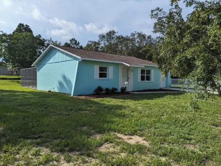 • Pool home • Spacious yard •