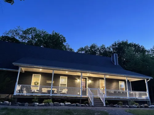 Spacious Cape Style house on 43 acres with pond