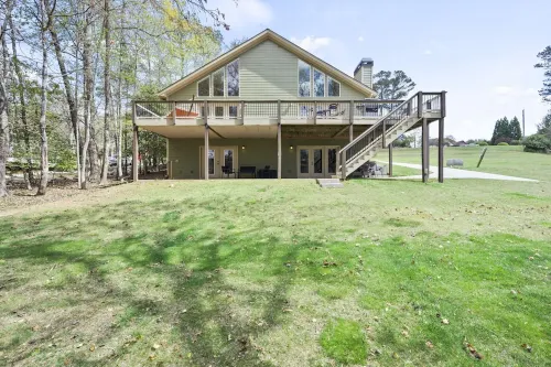 Waterfront with an easy walk to party dock and pet friendly home on Lake Lanier