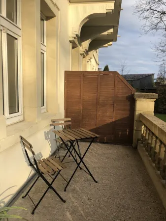 Vacation apartment with balcony overlooking the spa gardens of Bad Rothenfelde Отели в г. Бад-Ротенфельде