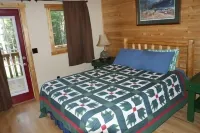 Sidell's Sturgeon River Log Cabin - Bonfire Pit, WiFi, Biking Trails, Rafting