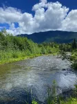 The River House:  A quiet getaway with Stunning Mountain views.