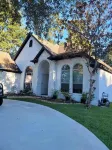 Charming 4-bedroom house in the gated lake community, April Sound!