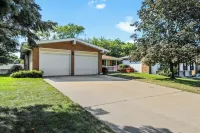 Central Location+ 2 living spaces+ covered patio!