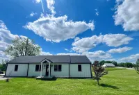 Eagles Crossing is a Newly Renovated 3-Bed Farmhouse with a Large Deck & Hot Tub