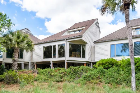 Distant Ocean Views and Access to Club Amenities - Charming Seabrook Retreat