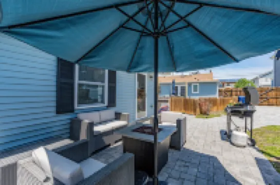 Bright Patio and Cozy Modern Living - Charming Coastal Haven