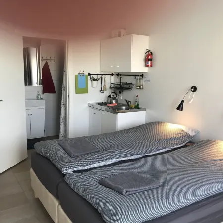 Lækjarkot Rooms and Cottages with Kitchen