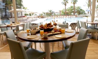 Astral Nirvana Suites- Half Board