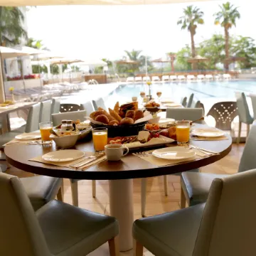 Astral Nirvana Suites- Half Board