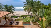 Beautiful Beach front home with 3 bedrooms and 3 1/2 bathrooms.