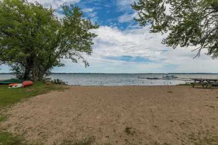 Welcome to Lake House by Lis, where stunning lake views and serene sunsets await