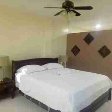 Spacious private and gated modern home within walking distance to beach/resorts. Rooms