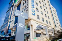 Al-Istiklal Suites Hotels near حديقة يوسف قدورة