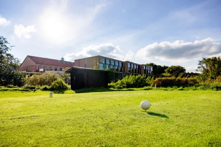 Hotel Breitenburg Отели в г. Кремпе