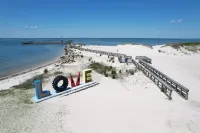 Cozy Outdoor Spaces and Modern Kitchen - Charming Victorian Haven Hotels in Cape Charles