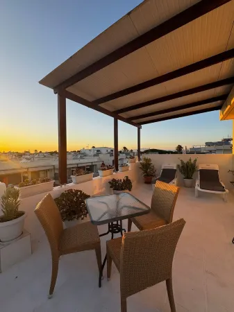 Prestige Holiday Apartments Отели рядом с достопримечательностью «Hippocrates Tree»