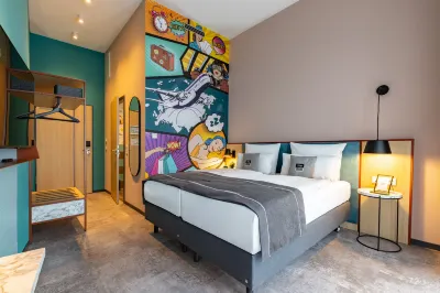 假日飯店 - the niu, 柏林機場 by IHG Capi附近的飯店