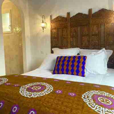 Magnificent village house with lush garden 5 minutes walk from the beach Rooms