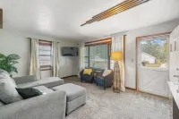 Welcoming 2-bedroom home with large deck and central location.