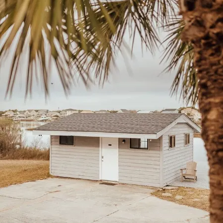 Spacious 5-bedroom house with private boat house/dock. Hot tub with serene views