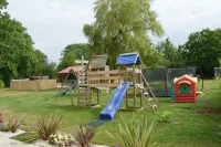 The farmhouse with the red shutters