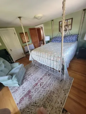 Experience Classic Charm in a Cozy 115-Year-Old Colonial
