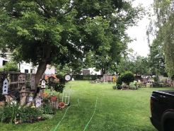 Large Private Fenced Yard with Guest Patio, Fire Pit and Surrounding Gardens.