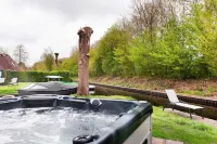 Bungalow in Friesland with Private Spa & Sloop
