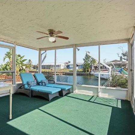 4 bedrooms home located on the deep water canal 13630 Garris Dr. Hudson Fl 34667