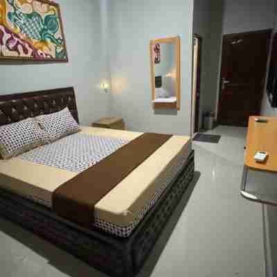 Hotel Dewata Yia Mitra RedDoorz Rooms