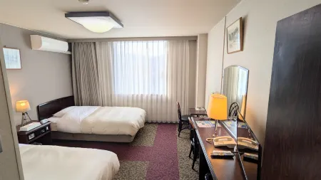 Hotel Crown Hills Miyoshi Отели рядом со станцией JR Miyoshi station