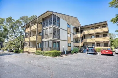 Beach Condo. Across from Ocean Annie's. 1st floor beach condo with large pool. Hotels near NMB Nature Trail