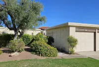 Sunny Palm Springs Resort style condominium living withTennis and swimming