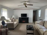 Near the water  and close to a  boat ramp