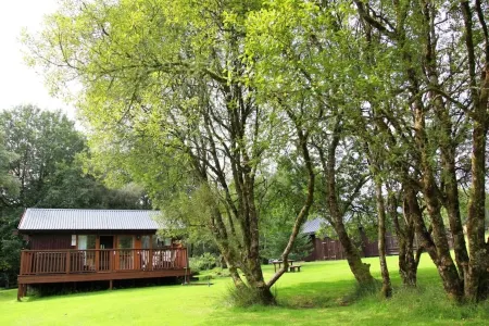 Elevated Loch View Cabin with WiFi, Electric Hot Tub and Mountain Views