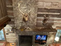 Prospect Mountain Cabin custom log home sportsman's paradise with fishing lake.