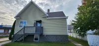 Charming 2-bedroom house with WiFi, AC in cool Escanaba Hotels in Escanaba