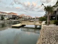Freshly updated canal front on one of Nat Geo's best beaches Hotels in Sunset Beach